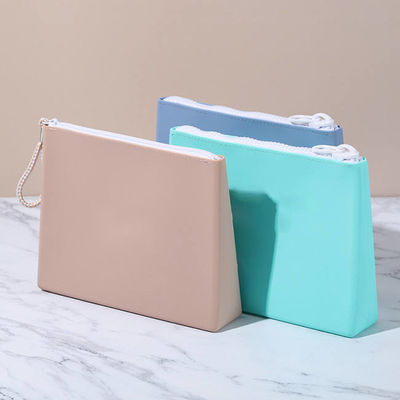 Sacchetto cosmetico in silicone morbido e resistente colore personalizzato per il trucco in movimento